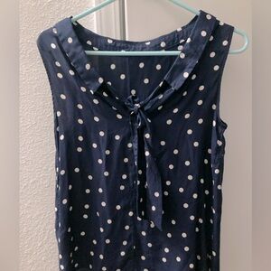 Navy blue with white polka dot Boden sleeveless silk top. Size 6